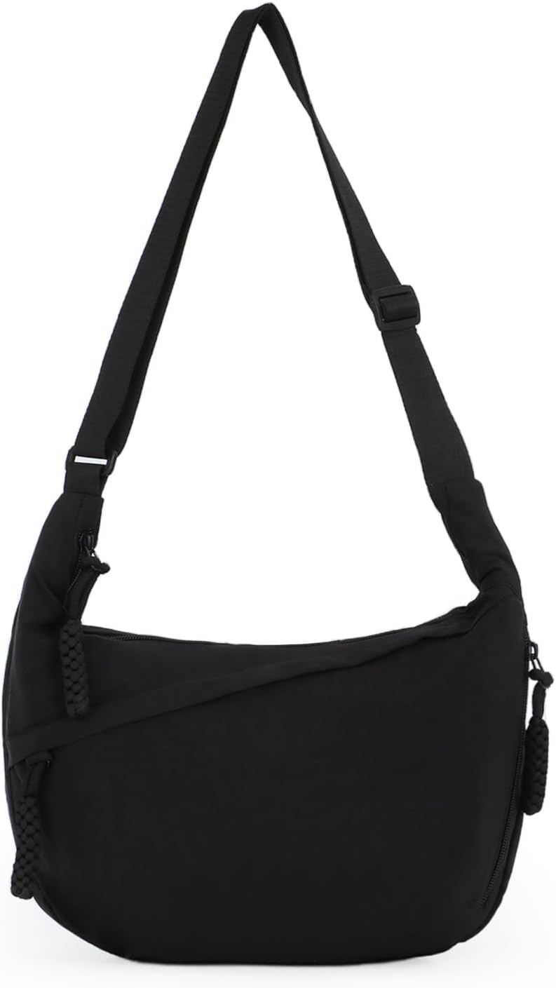 Pavo Monitor Arm installed on a wooden desk with adjustable height